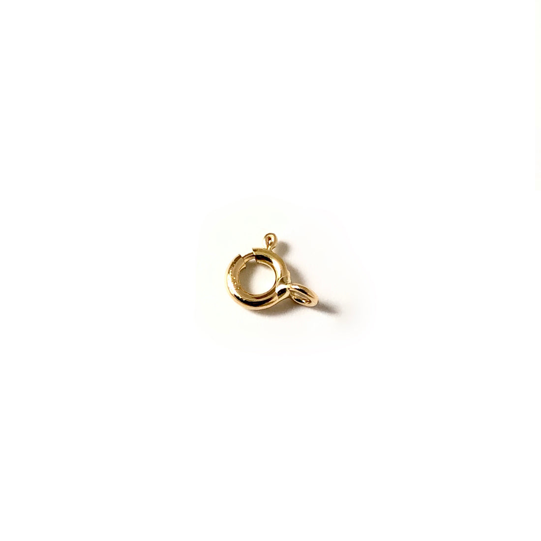 Anneau ressort 5mm.  or jaune 750