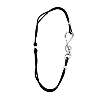 Bracelet clé de sol sur cordon
