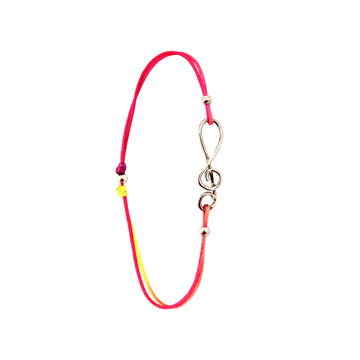 Bracelet clé de sol sur cordon