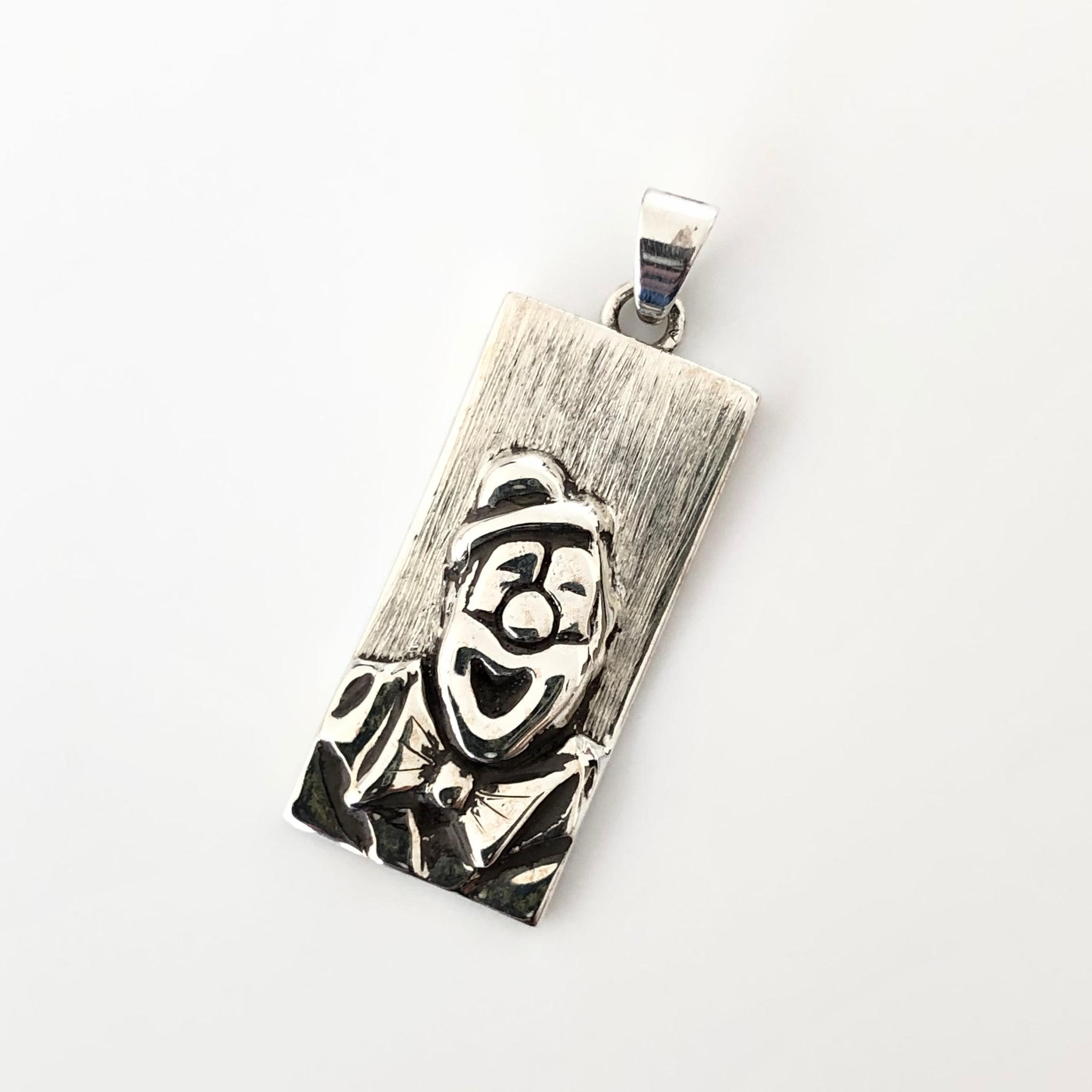 Pendentif clown rieur