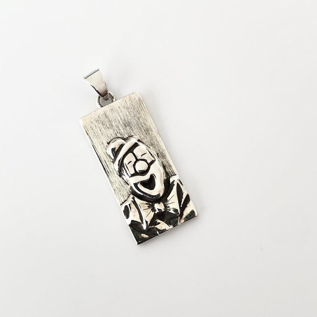 Pendentif clown rieur