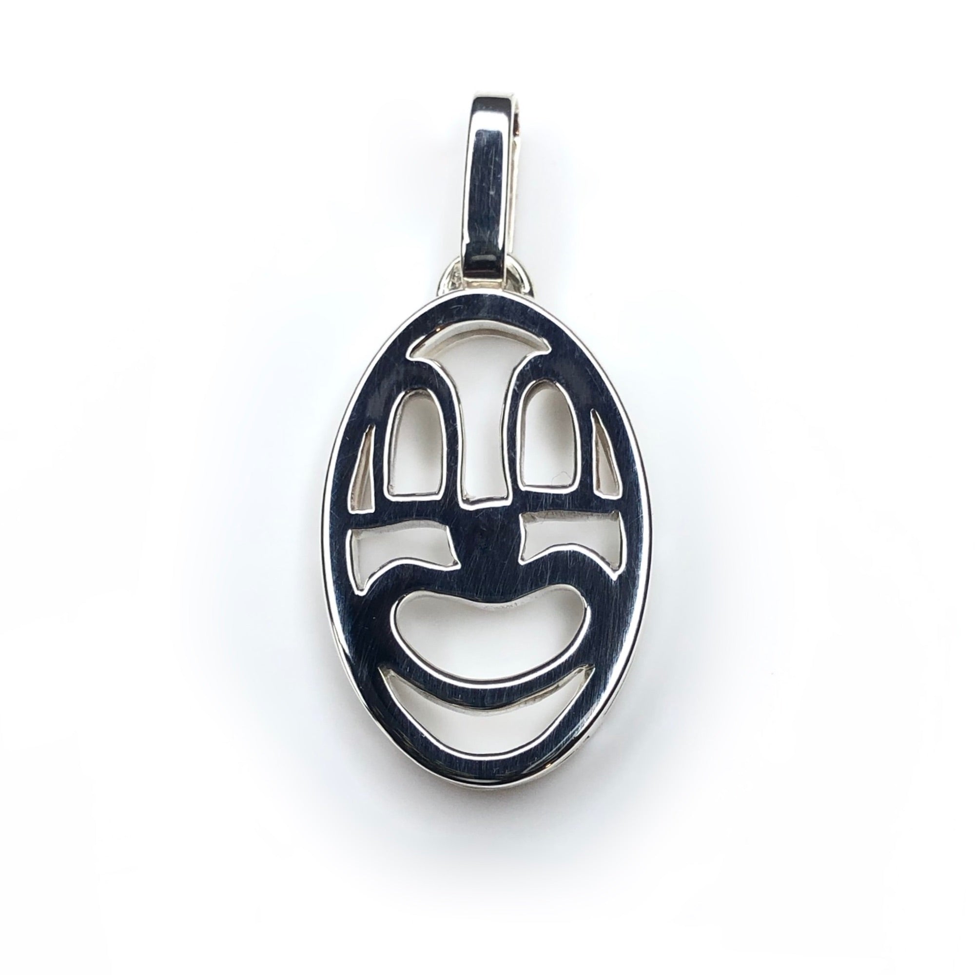 Pendentif clown en argent 925.