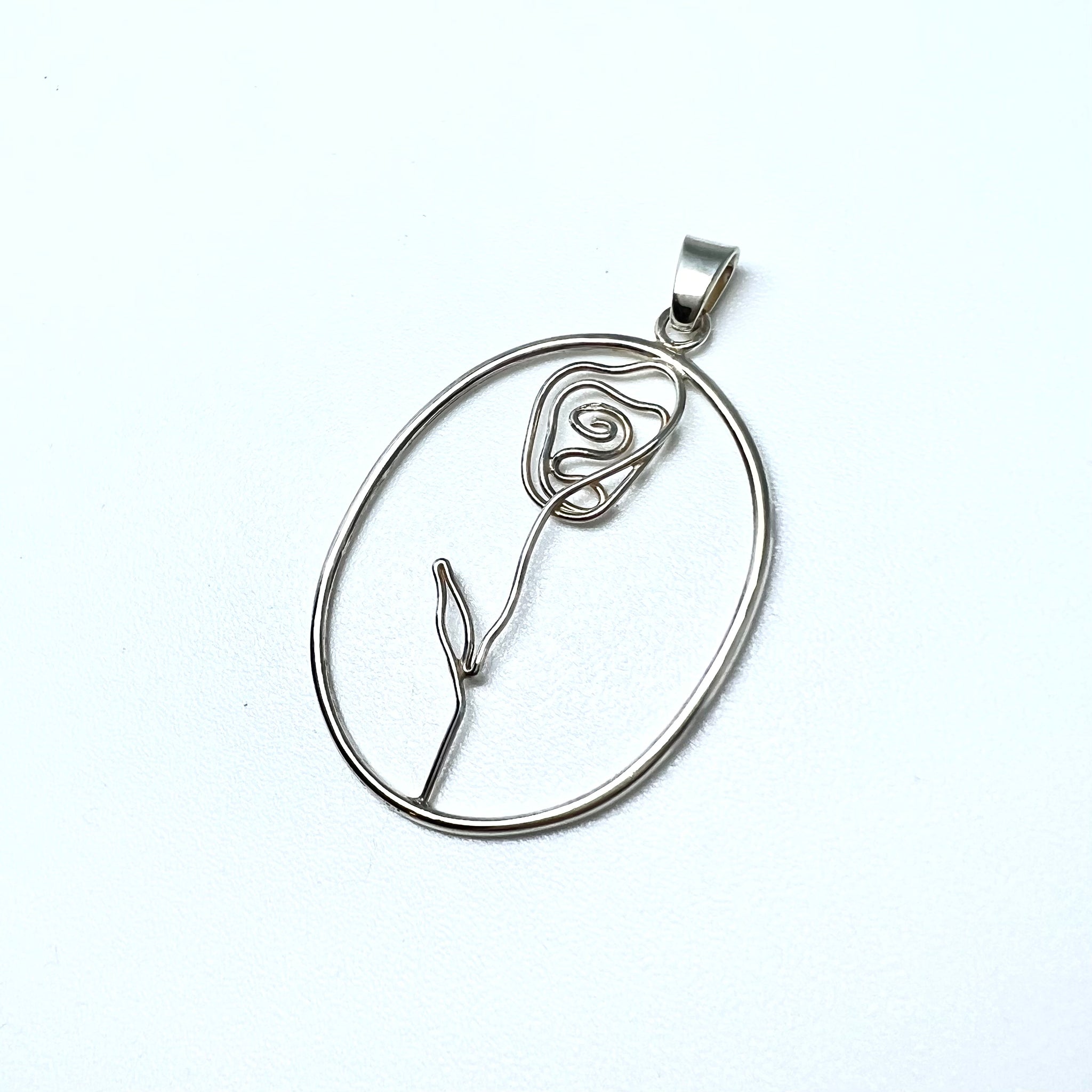 Pendentif fleur fil