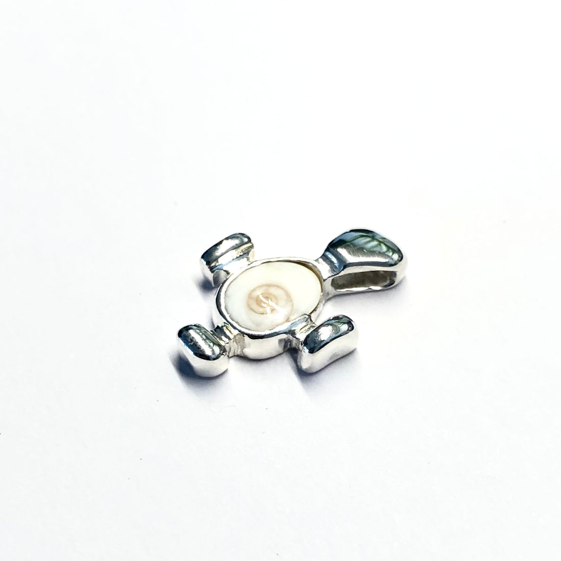 Pendentif puzzle, oeil de sainte Lucie