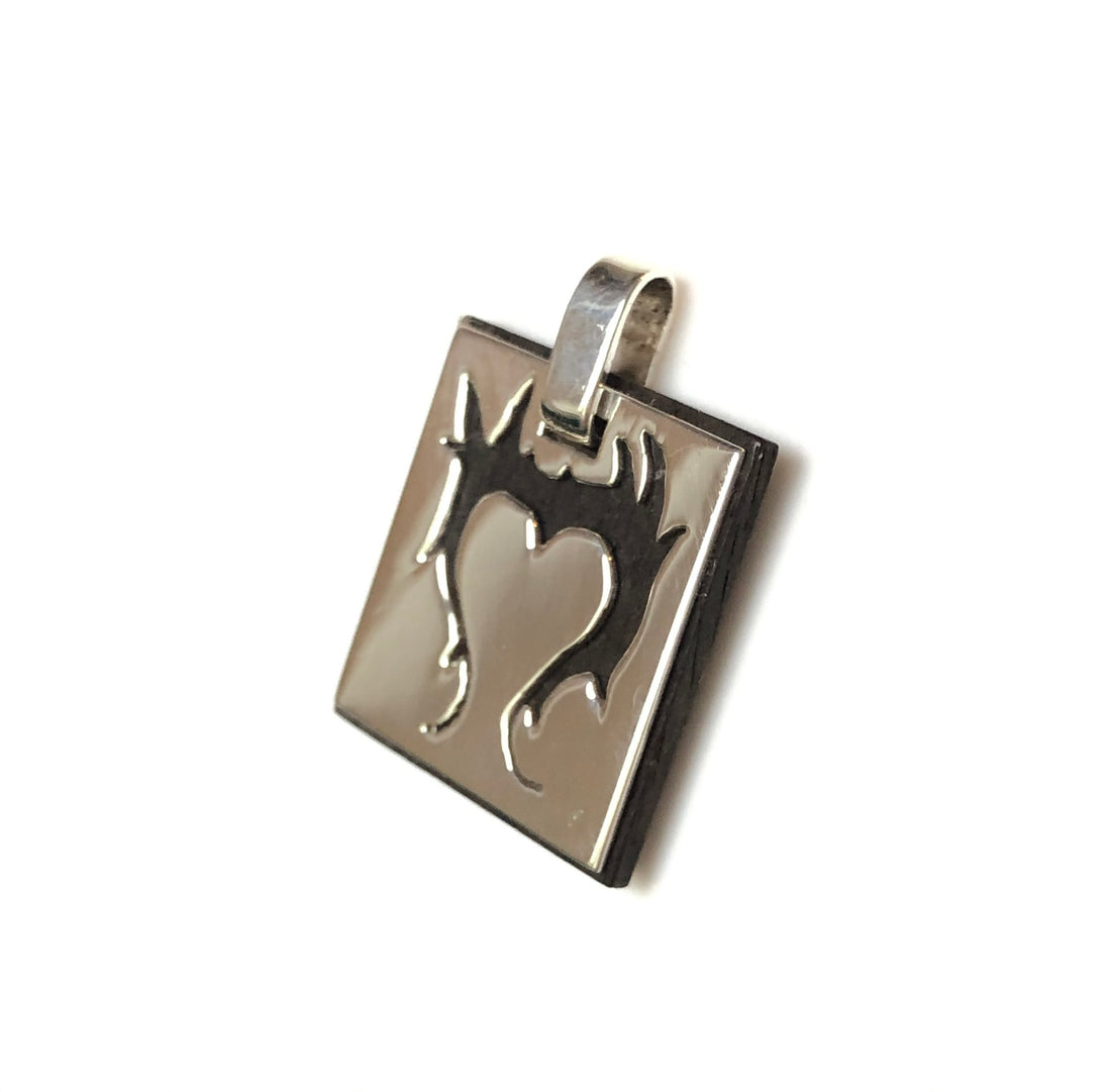 Pendentif coeur enflammé